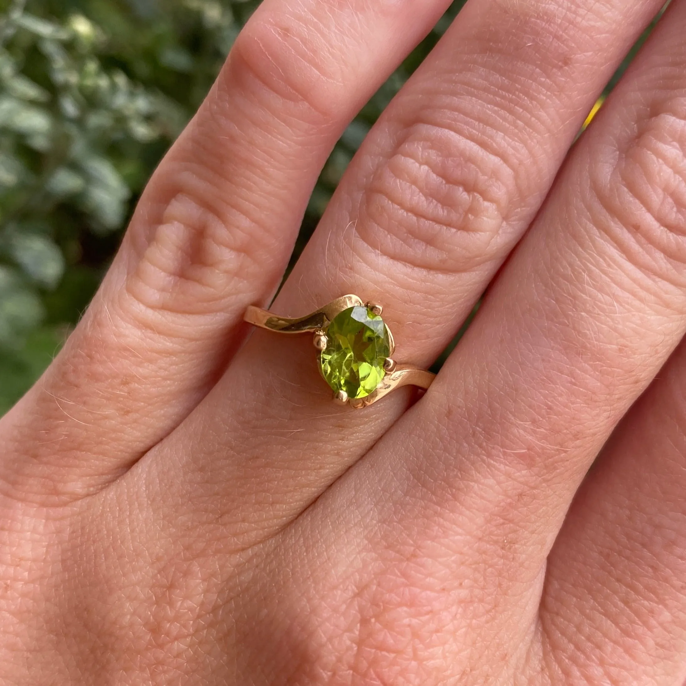 14k Oval Peridot Ring with Bypass Design