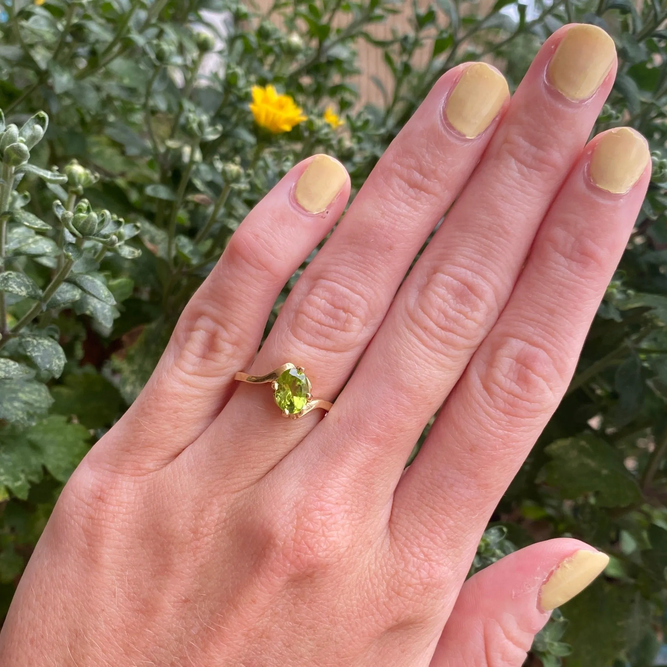 14k Oval Peridot Ring with Bypass Design