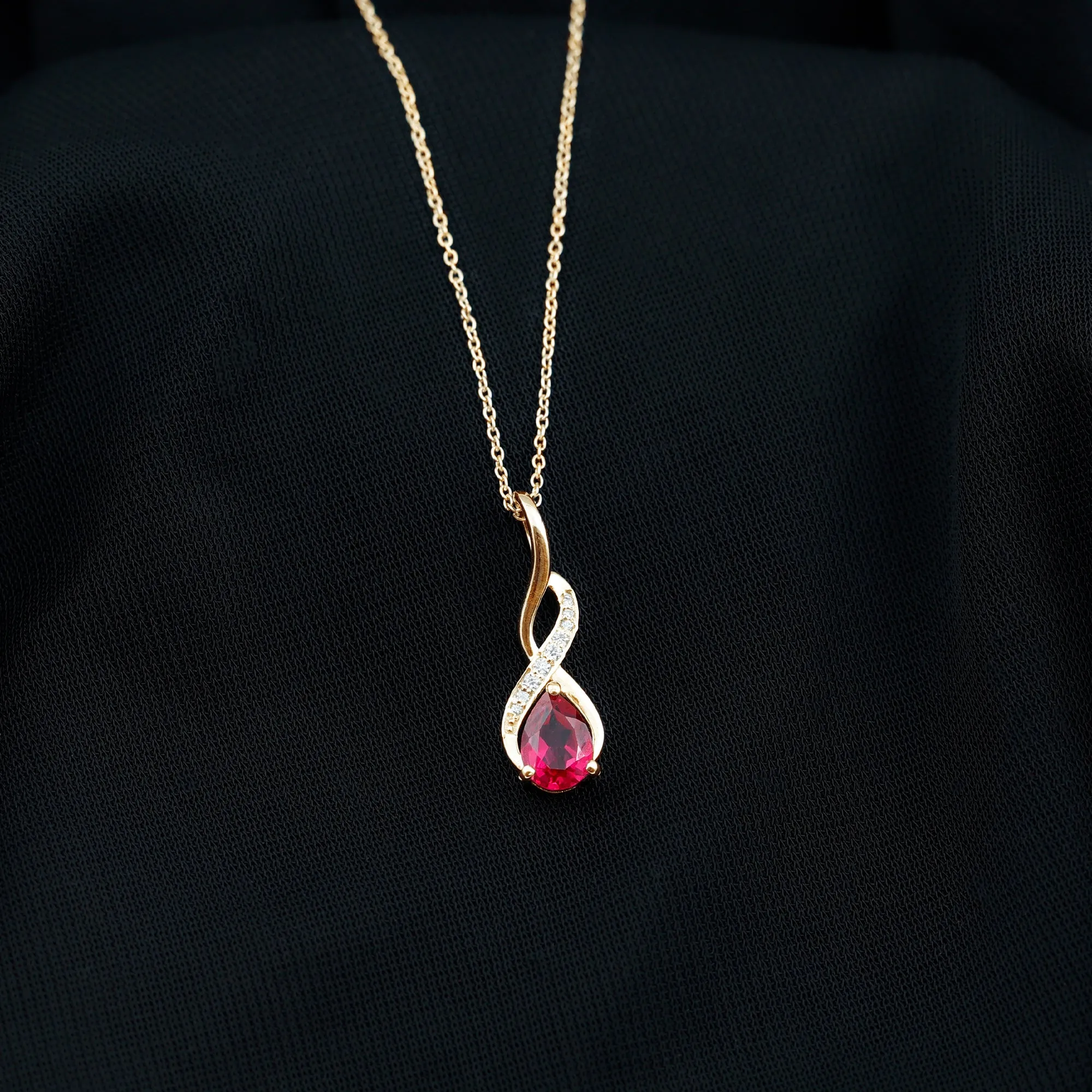 3/4 CT Created Ruby Teardrop Infinity Pendant with Moissanite