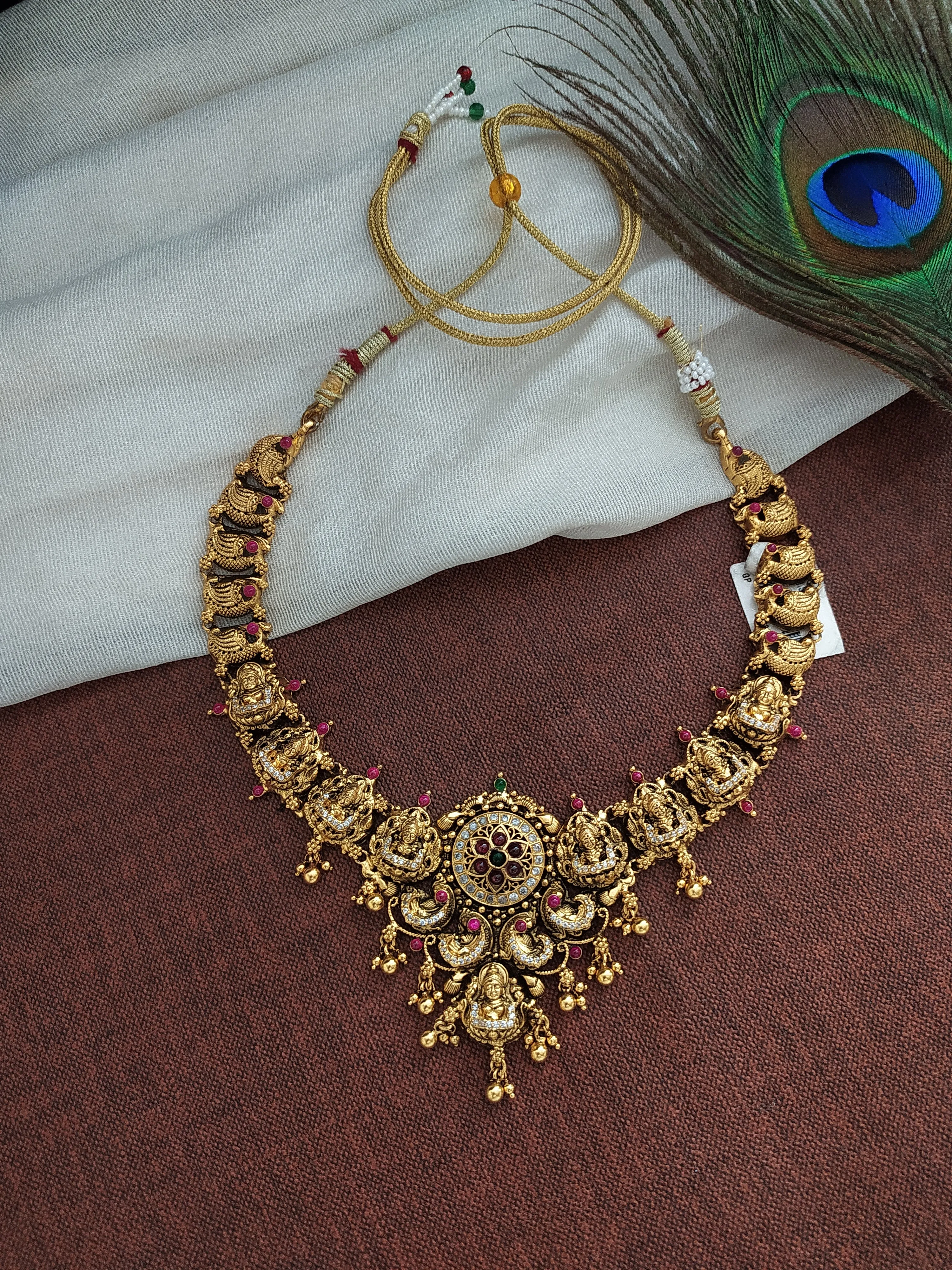 Alluring Silver Necklace With Golden Dangling in Ruby stone
