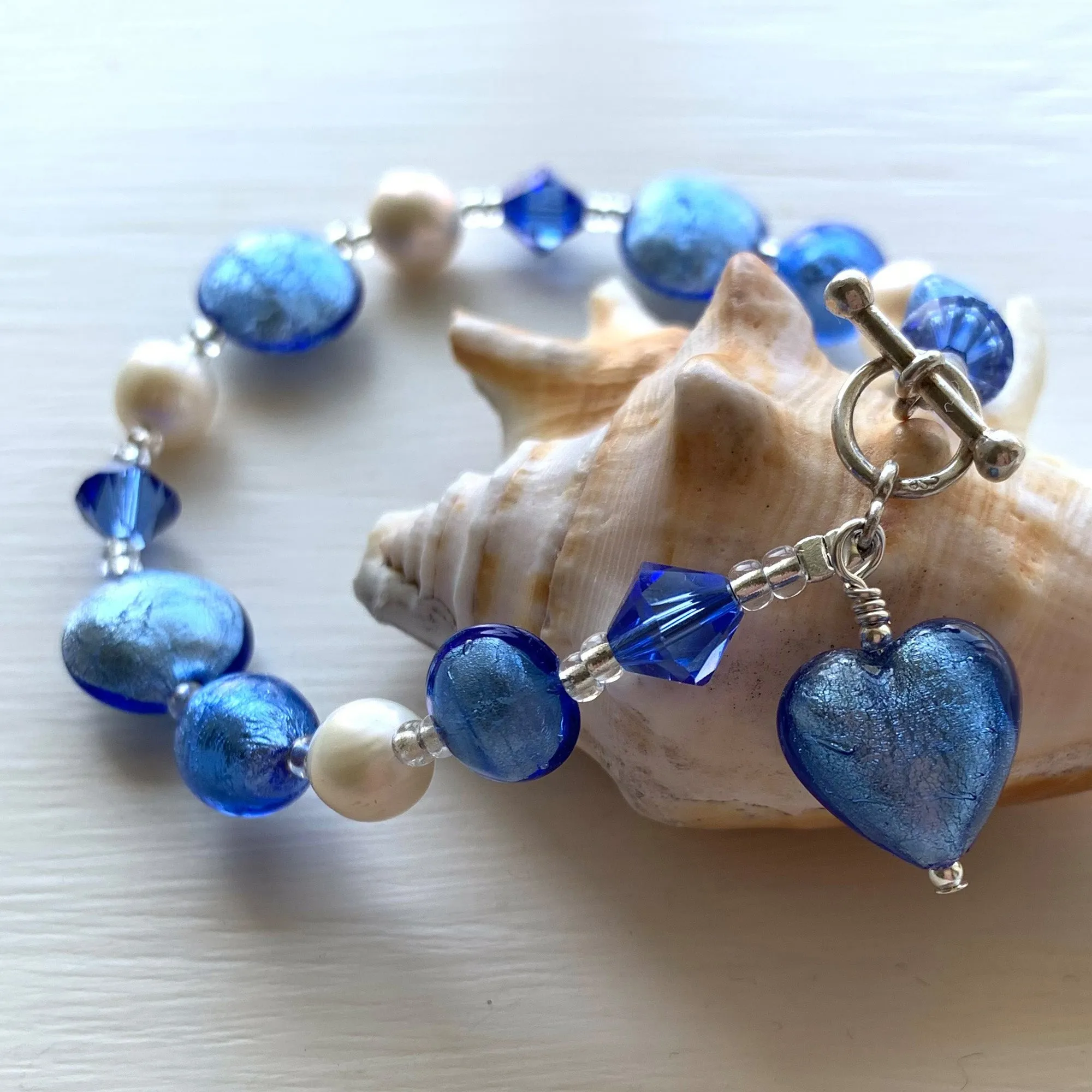 Bracelet with cornflower blue  Murano glass beads, Swarovski© crystals, pearls, charm