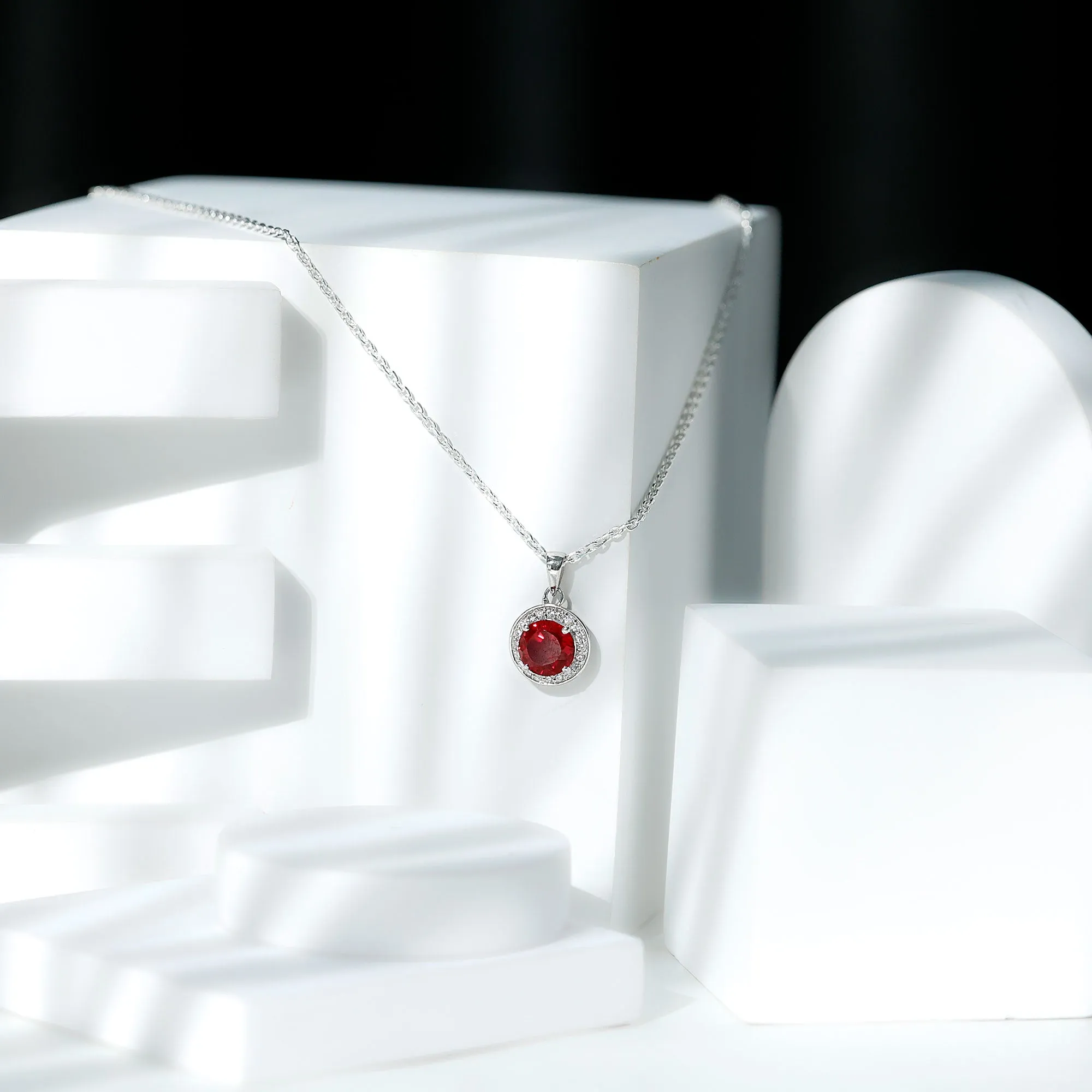 Created Ruby and Moissanite Classic Halo Pendant