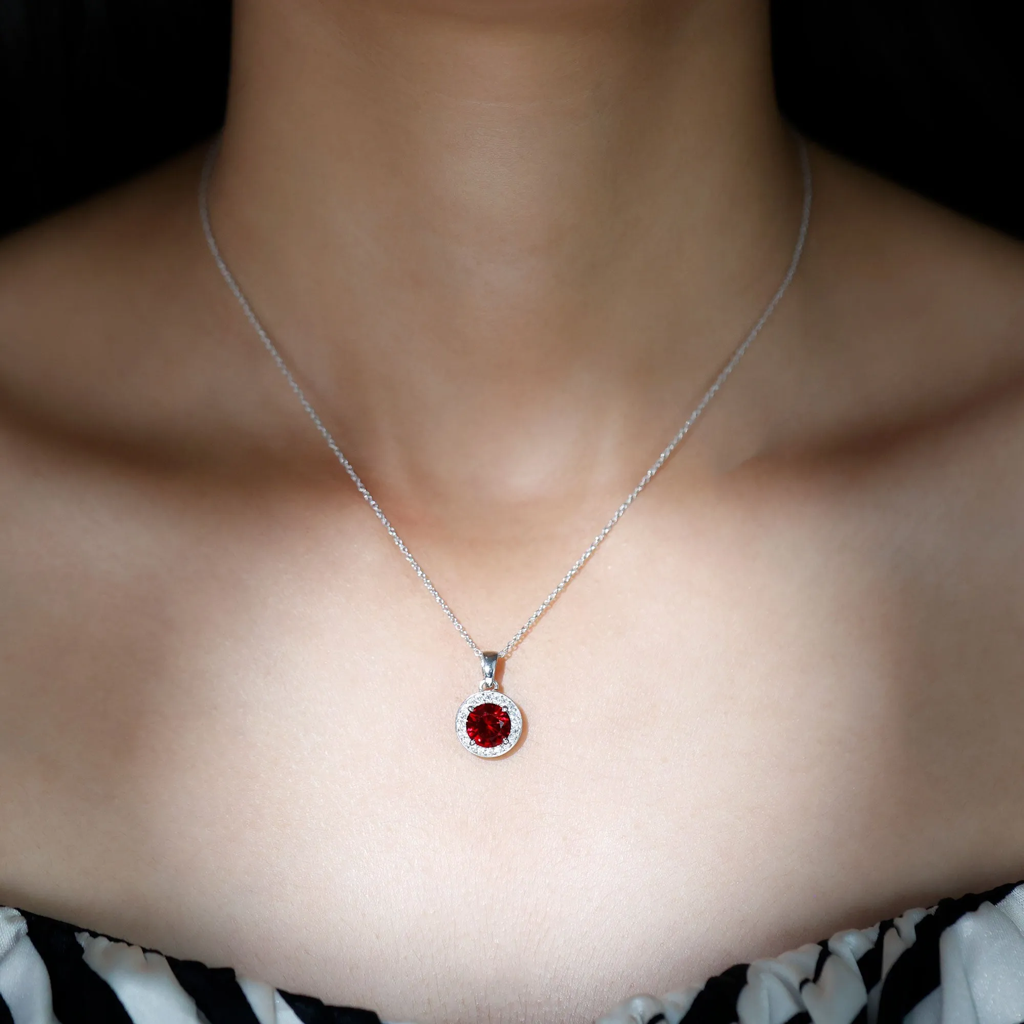 Created Ruby and Moissanite Classic Halo Pendant