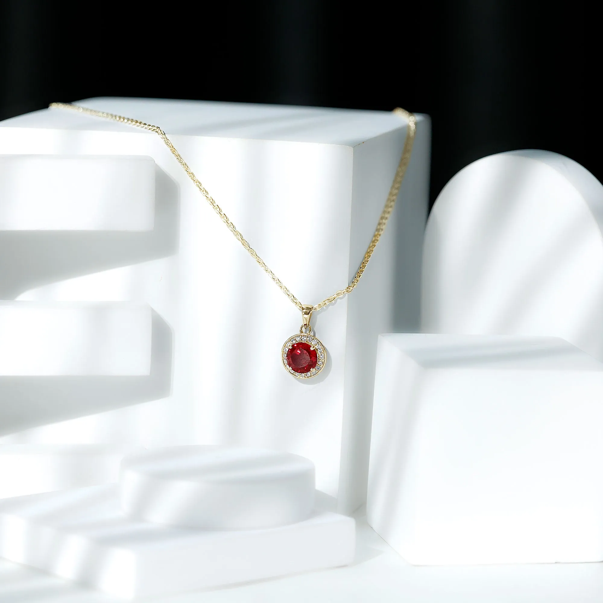 Created Ruby and Moissanite Classic Halo Pendant