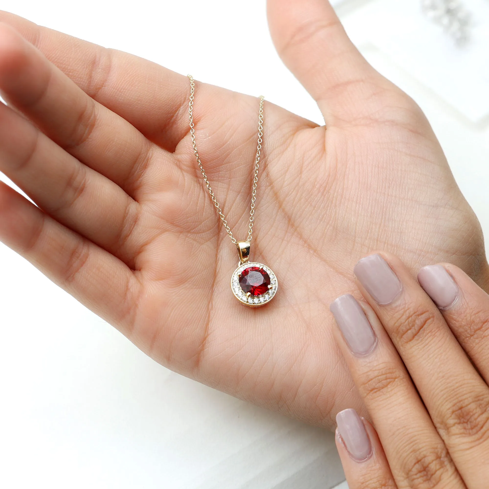 Created Ruby and Moissanite Classic Halo Pendant