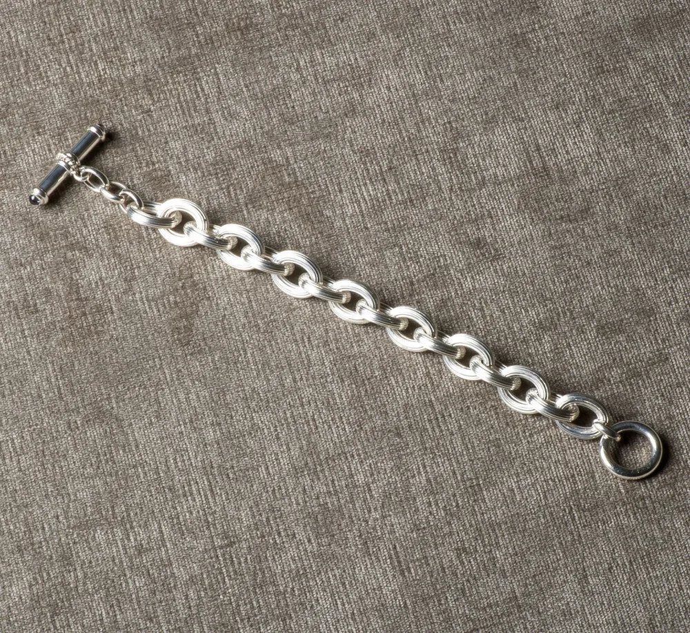 DFS | Sterling Silver Handmade Reeded Cable Bracelet with Iolite Toggle