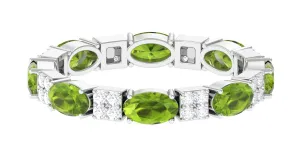 Oval Cut Peridot and Diamond Eternity Ring