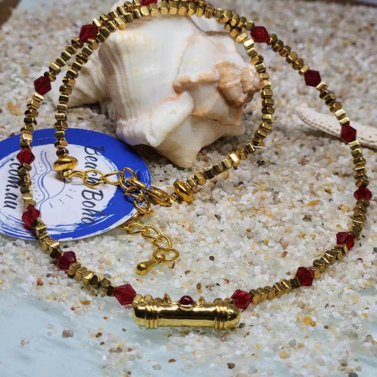 RUBY T - HEMITITE GOLD SWAROVSKI RUBY CRYSTAL NECKLACE