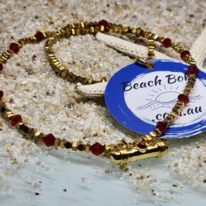 RUBY T - HEMITITE GOLD SWAROVSKI RUBY CRYSTAL NECKLACE